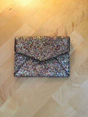 Rebecca Minkoff Leo Envelope Clutch in a multicolor glitter finish